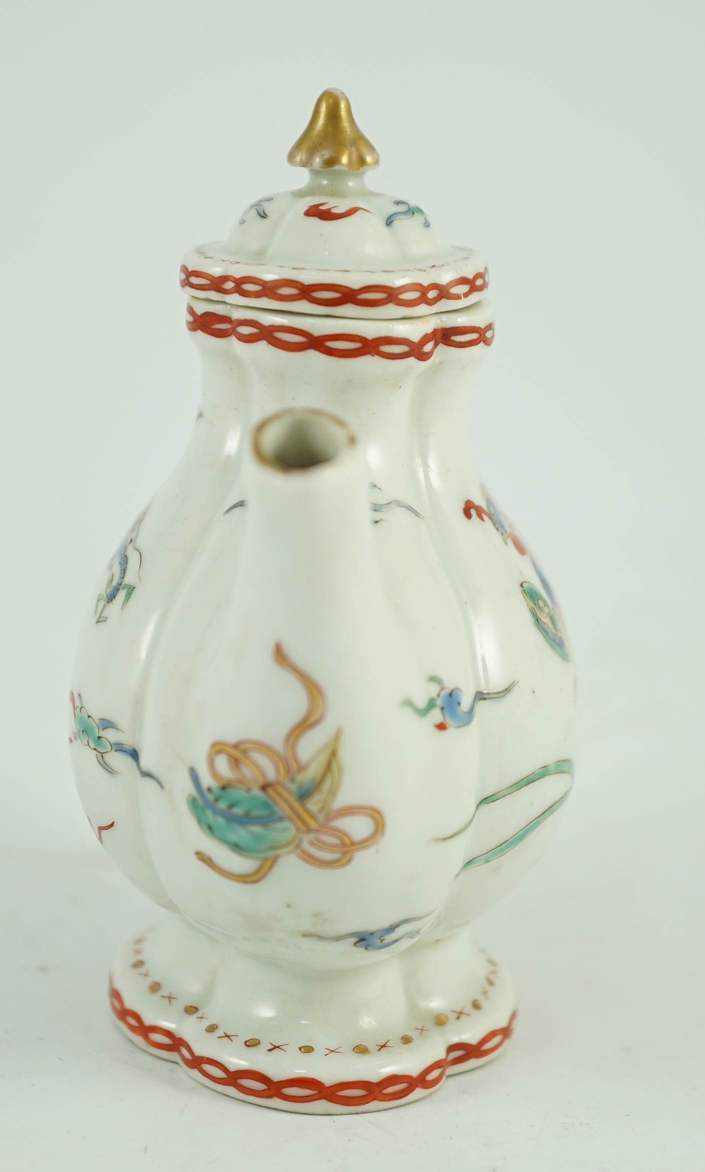A small Japanese Arita kakiemon style water or teapot, possibly Edo period, 11 cms high, 10.8cm high